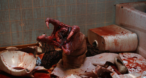 Das Monster aus dem Klo aus dem Horrorfilm von Vivieno Caldinelli Das Monster aus dem Klo aus dem Horrorfilm von Vivieno Caldinelli